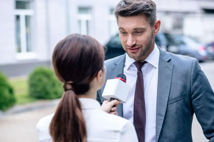 Financial professional interviewed in studio for media coverage