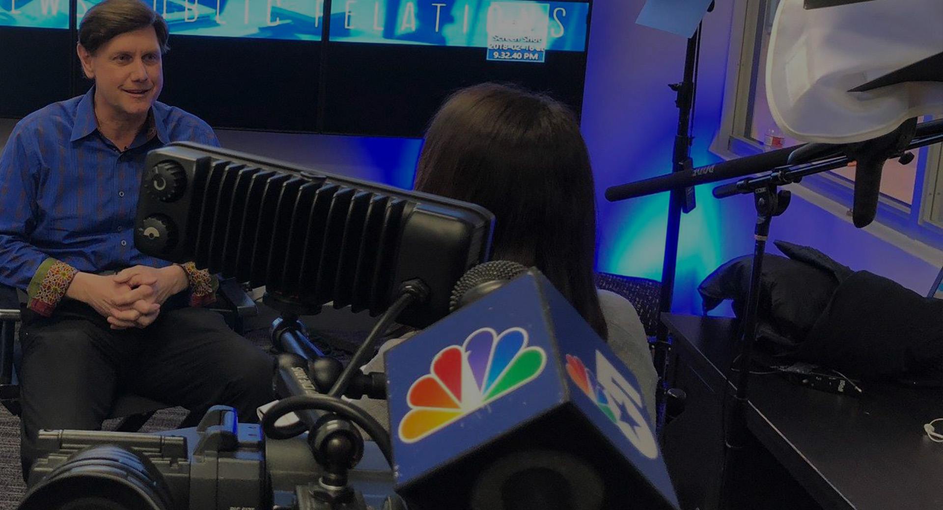 Jeff Crilley being interviewed in a television studio